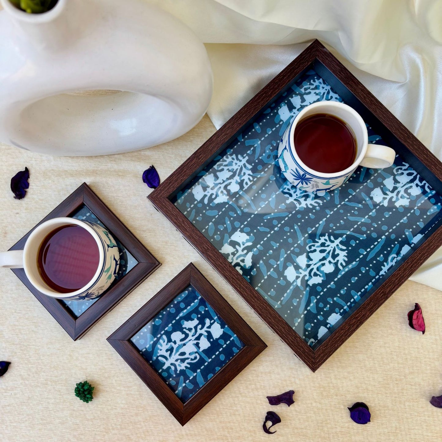 Timeless indigo tray and coasters with stitch design, blending traditional artistry with modern sophistication for luxury spaces