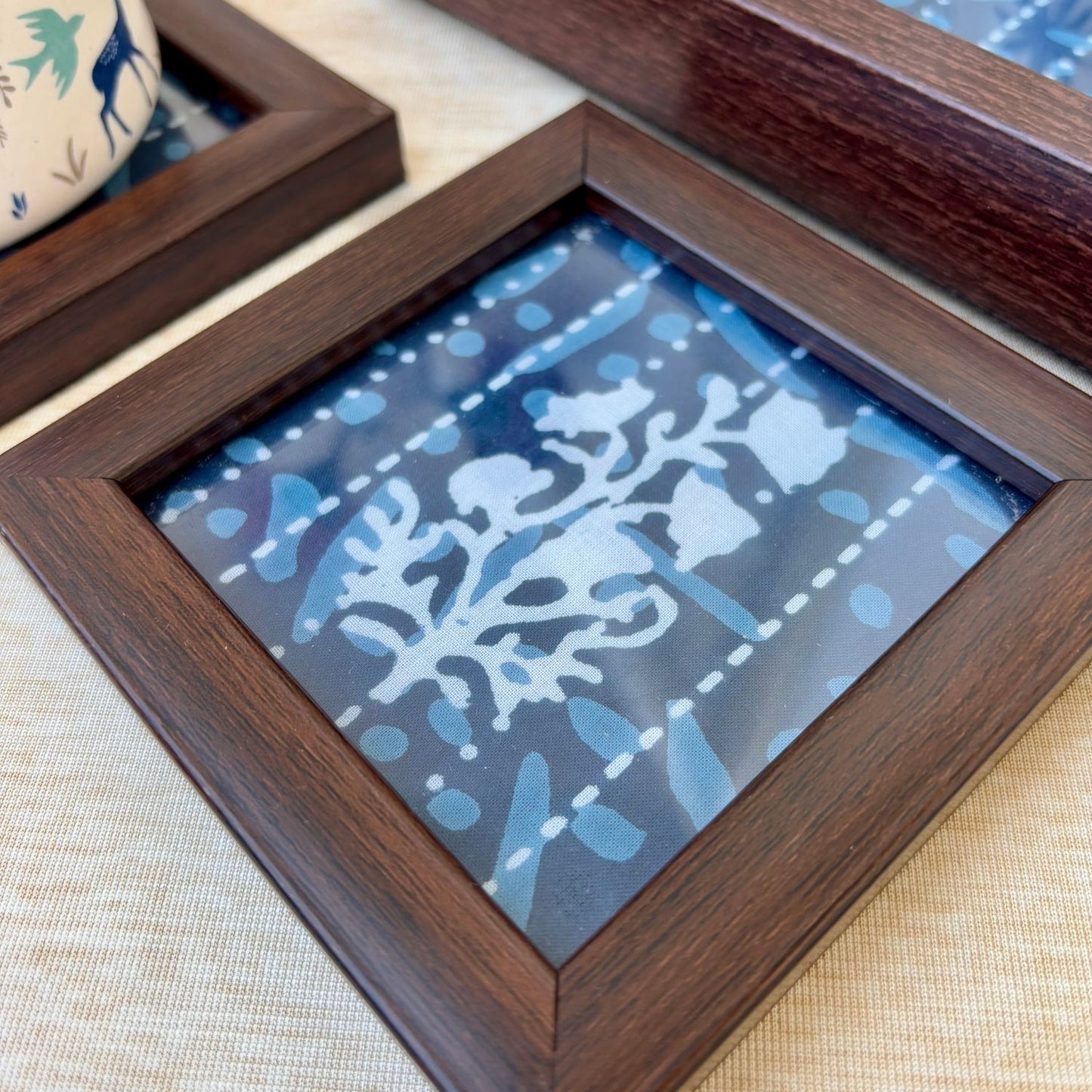 Exclusive indigo print coasters with stitch design, perfect for high-end entertaining and enhancing your décor
