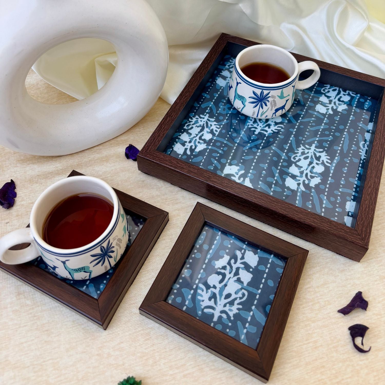 Bespoke indigo print serving tray with coasters, designed for discerning tastes and luxurious Indian homes.