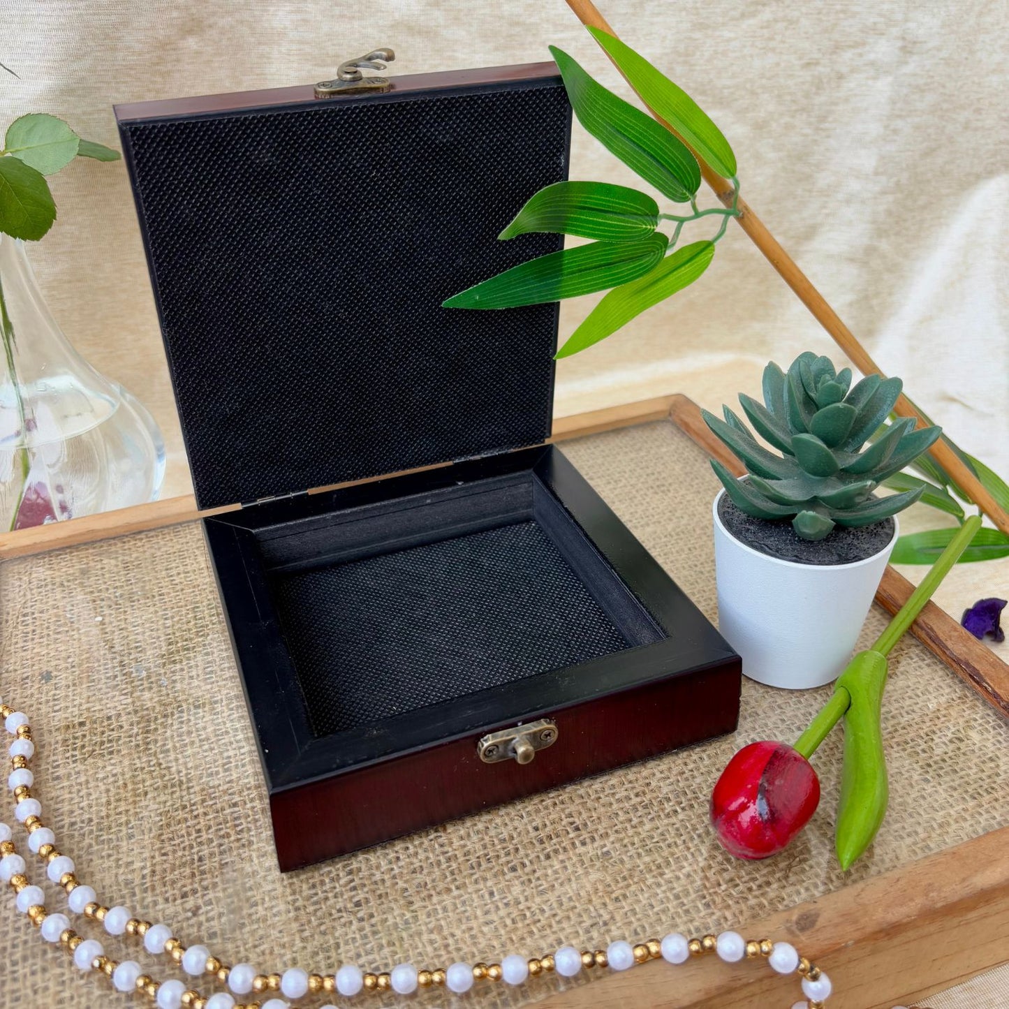 Luxury handcrafted jewellery box featuring an Indian woman adorning herself with jewellery. A perfect organizer for rings, earrings, and bangles, ideal for gifting.