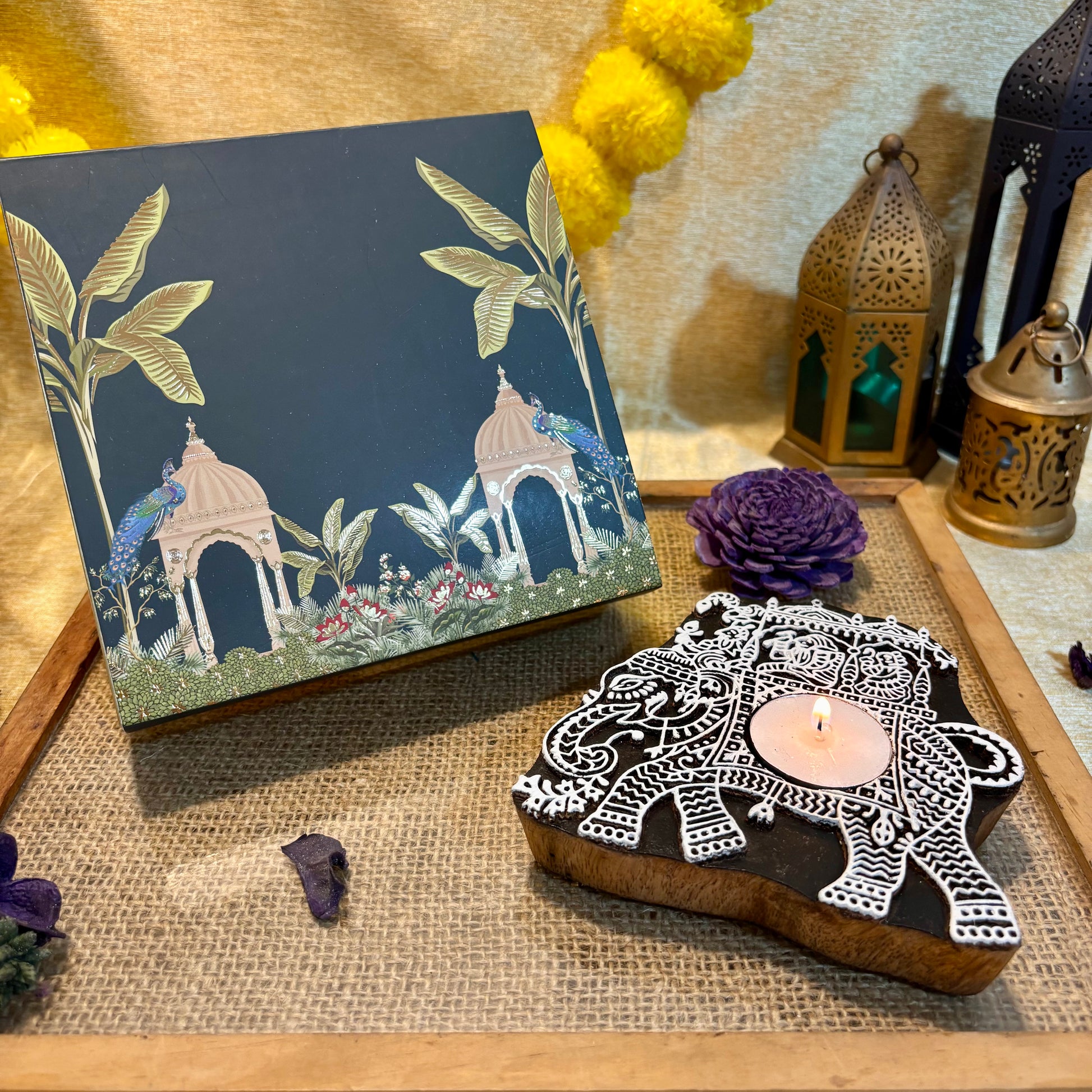 Gajraj wooden block tea light holder made from a traditional block printing wood block with elephant design
Traditional Indian wooden block used as decorative tea light holder by ATLA